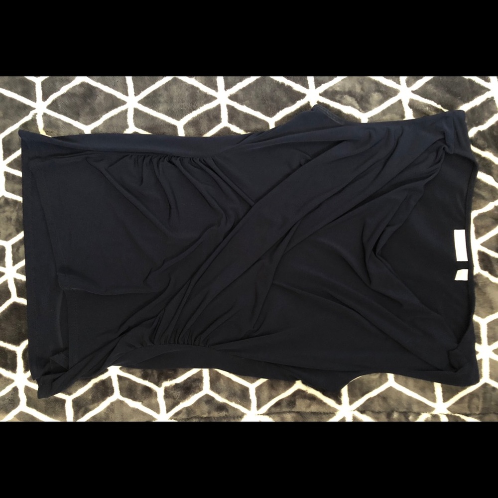 2 brand new tops & 1 slightly used top for sale.